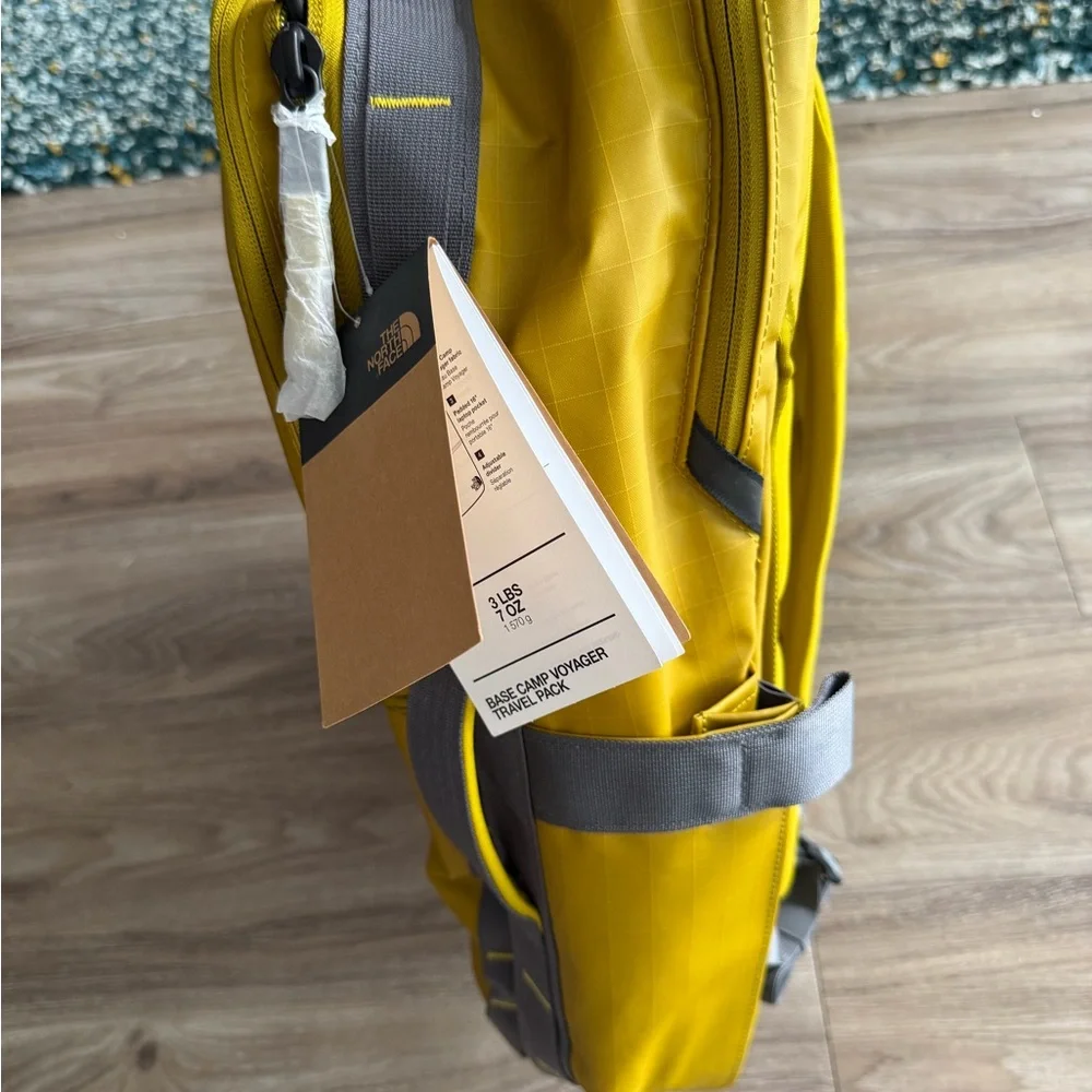 The North Face Men's Yellow Backpack with Gray Accents